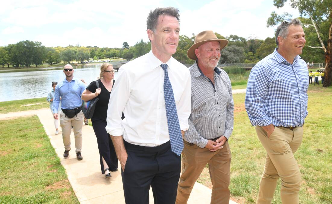NSW Premier Chris Minns inspects the Lake Canobolas upgrade alongside Orange City Council mayor Jason Hamling and Member for Orange Phil Donato. Picture by Jude Keogh