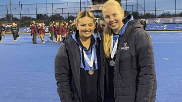 Orange CYMS players Courtney Hogan and Ally Cook at the Australian Country Hockey Championships. Picture supplied