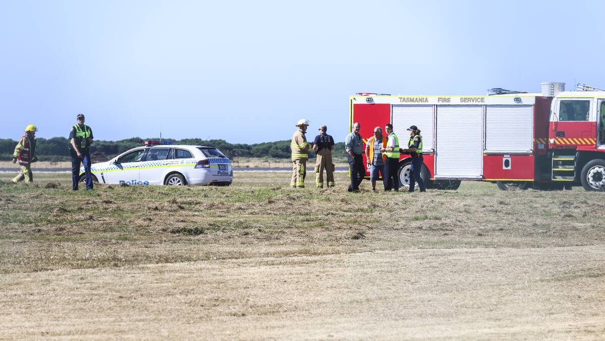 Emergency services respond to a plane crash at Devonport Airport. Picture: Cordell Richardson