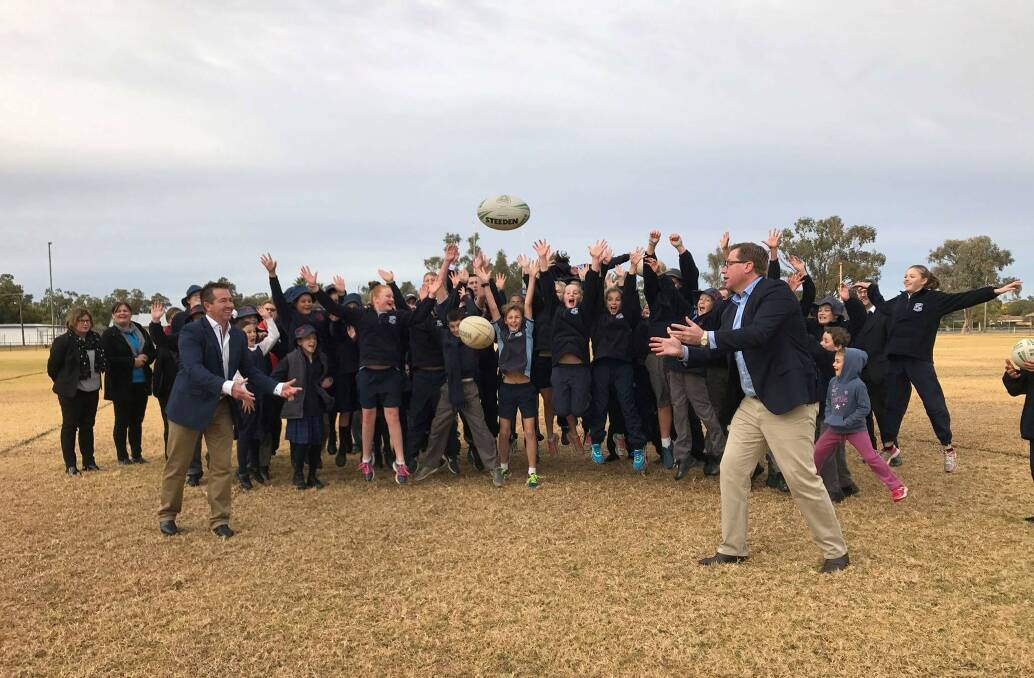 Get Active: Troy Grant and Paul Toole getting into the game. We want every child in NSW to be able to use their voucher, parents to speak to their local club.