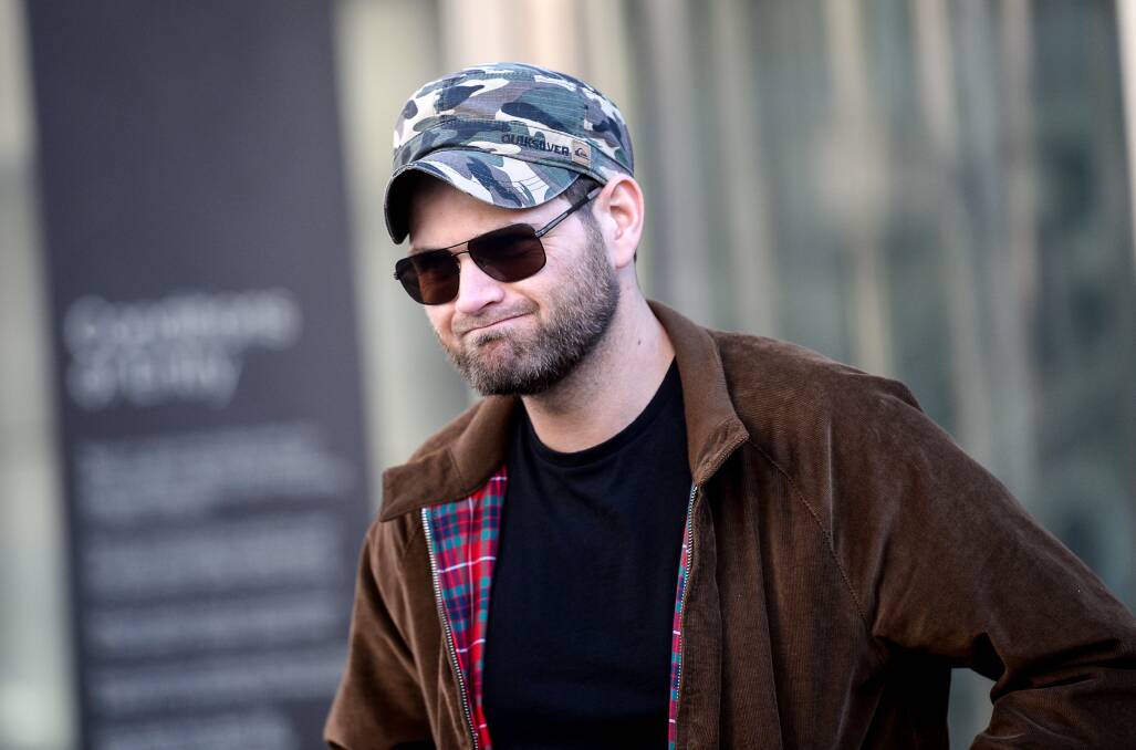 Luke Wallis leaves the County Court in Melbourne on Friday. Picture: JUSTIN McMANUS