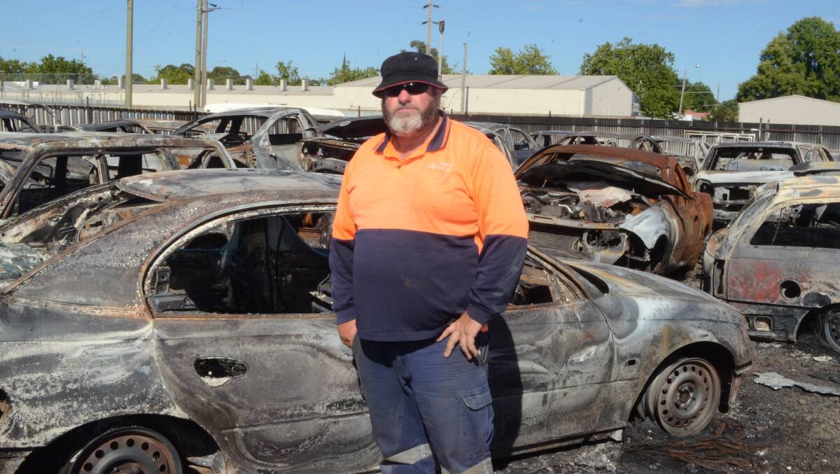 BLEAK OUTLOOK: John Grum of JG Auto Sales standing among what remained of his business's holding yard on Sunday. Photo: DAVID FITZSIMONS