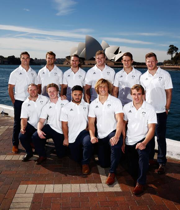 RUGBY SEVENS: Pat McCutcheon (back, second from right) with the rest of the Rugby Sevens team on annoucement day, Thursday July 14, at Darling Harbour. Photo: GETTY IMAGES. 