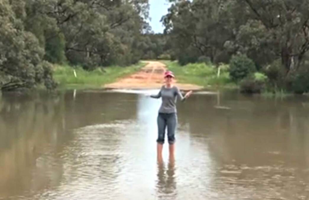 DROWNING IN DANDALOO: Kate Broughton talks about the poor condition of Jamea Road, especially since the rain has begun. Photo: Still from YOUTUBE.com