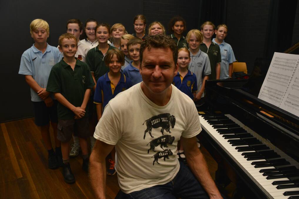 Chorus of students: Renowned composer and conductor Paul Jarman took the students through a range of workshops at Dubbo College Delroy Campus. Photo: Paige Williams 