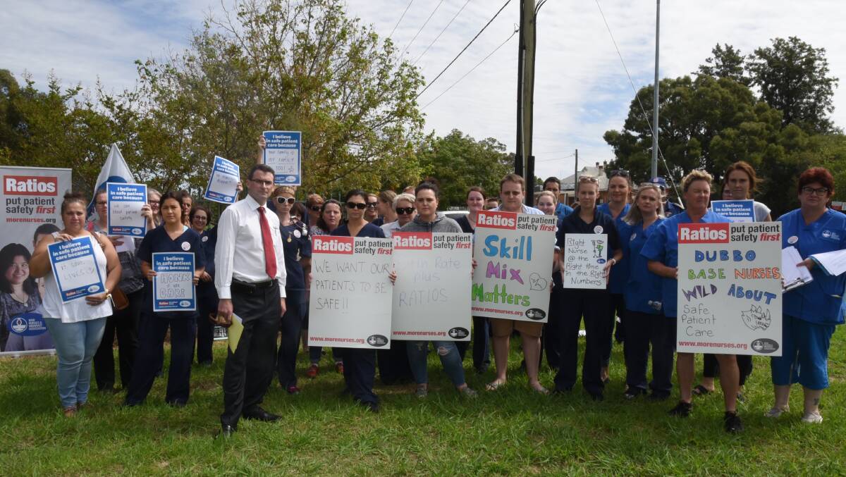 TAKING A STAND: General secretary of the NSW Nurses and Midwives’ Association Brett Holmes ( in white shirt) meets with members in Dubbo on Thursday. Photo: PAIGE WILLIAMS