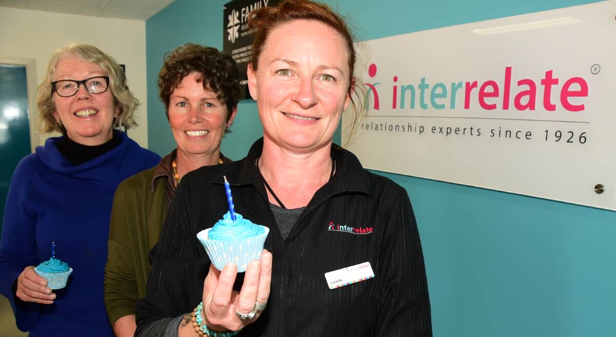 ACKNOWLEDGING TRAUMA: Interrelate's Anne Heath, Jackie Wake and Lucinda Morrish with their cupcakes to raise awareness of childhood abuse. Photo: PAIGE WILLIAMS