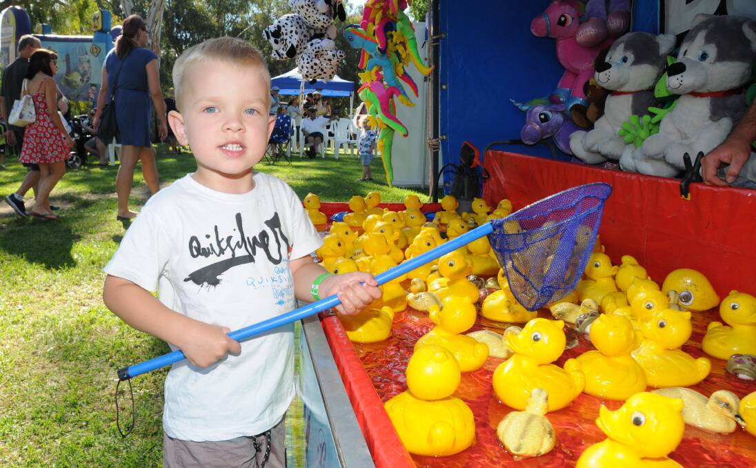 Great fun: Hudson Corby is ready for action at the Christmas Fair, organised by the Rotary Club of Dubbo South. Photo: PAIGE WILLIAMS
