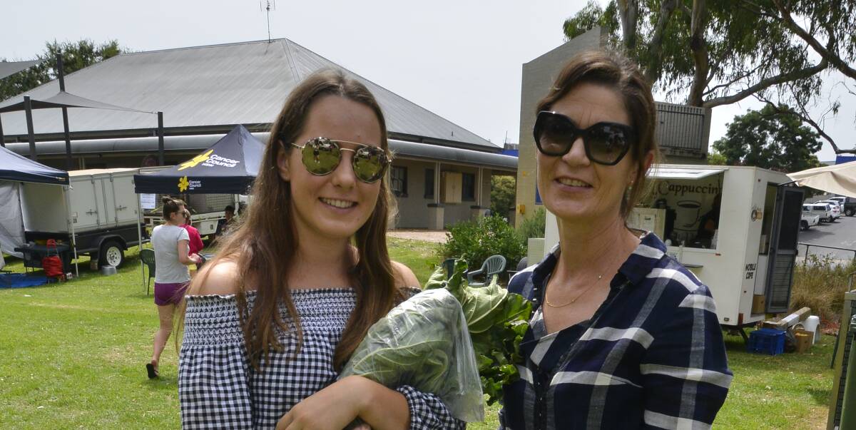 Mother and daughter duo Heidi Noonan and Angela Noonan picking up some local fresh produce at the markets on Saturday.