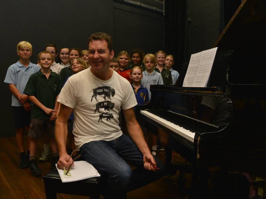 Chorus of students: Renowned composer and conductor Paul Jarman took the students through a range of workshops at Dubbo College Delroy Campus. Photo: Paige Williams
