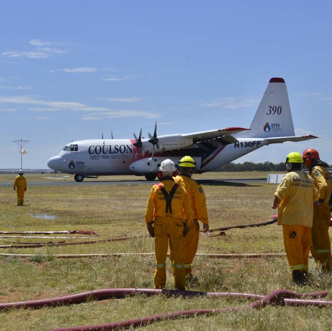 SUPPORT: A large air tanker was deployed from Victoria to the Dubbo Airport to assist firefighting efforts on the weekend. Photo: PAIGE WILLIAMS