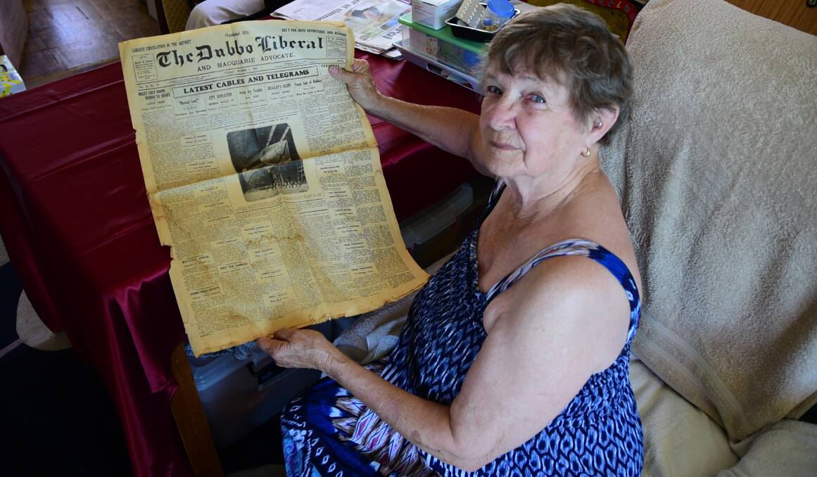FAMILY HISTORY: Joan Burt said the 86-year-old newspaper was found under the floor in a house in Wingewarra Street. Photo: PAIGE WILLIAMS