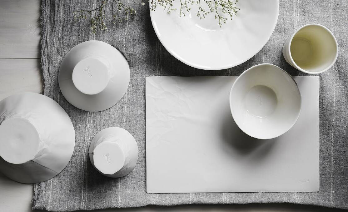 CUTTING EDGE: Hayden Youlley's Paper Series range of homewares includes cleverly designed ceramic cups, bowls, dinner plates and vases.