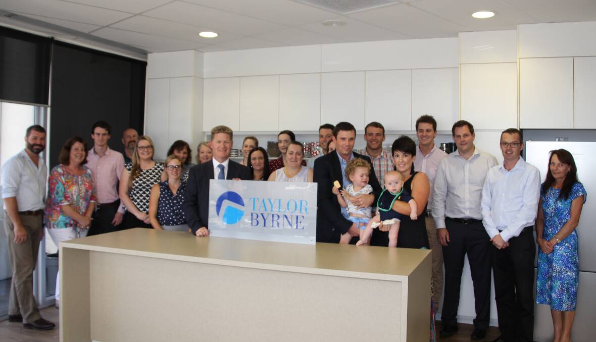 A group shot from the Taylor Byrne morning tea with the Dunsdon Family and Ian Finlayson, head of the Royal Flying Doctor Service Queensland section marketing and fundraising department.