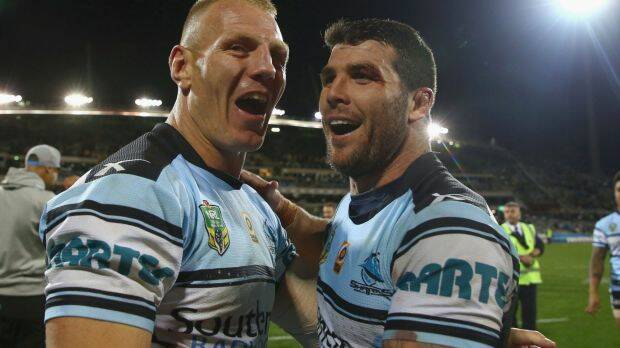 Experienced pair: Luke Lewis and Michael Ennis celebrate the win. Photo: Getty Images