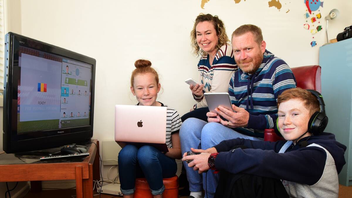 CONNECTED: Rosa, Peita, Kent and Levi Buchanah are happy to have the NBN. Photo: BELINDA SOOLE