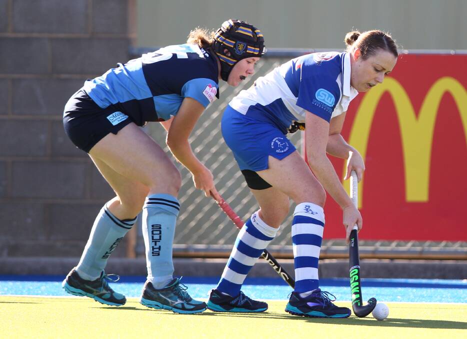 PRESSURE: Jodie Webb (right) and her fellow Saints face women's Premier League Hockey competition leaders Bathurst City this Saturday. St Pat's will be looking to making amends for a 3-2 defeat earlier this season. Photo: PHIL BLATCH