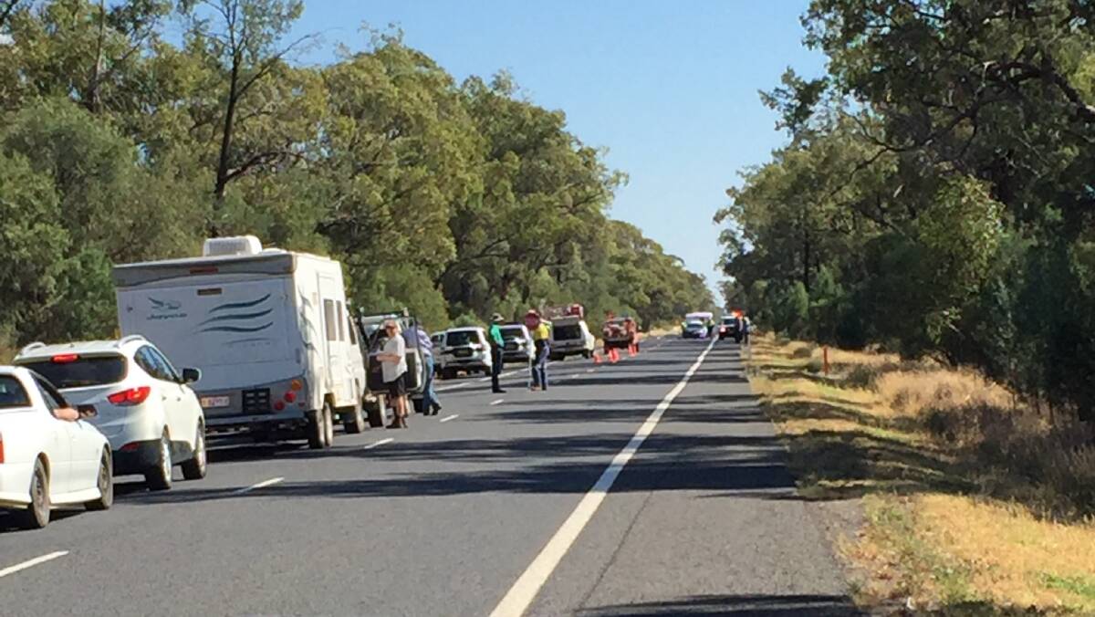 Emergency services are at the scene of a triple fatality on the Mitchell Highway. Pic: Cassie Miller-Coen