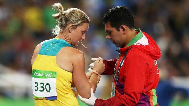 Kim Mickle dislocated her shoulder in the javelin. Photo: Cameron Spencer

