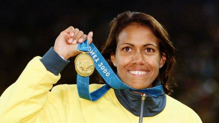 An ecstatic Cathy Freeman, the first Australian to win gold in the women's 400 metres since Betty Cuthbert Photo: Rick Stevens