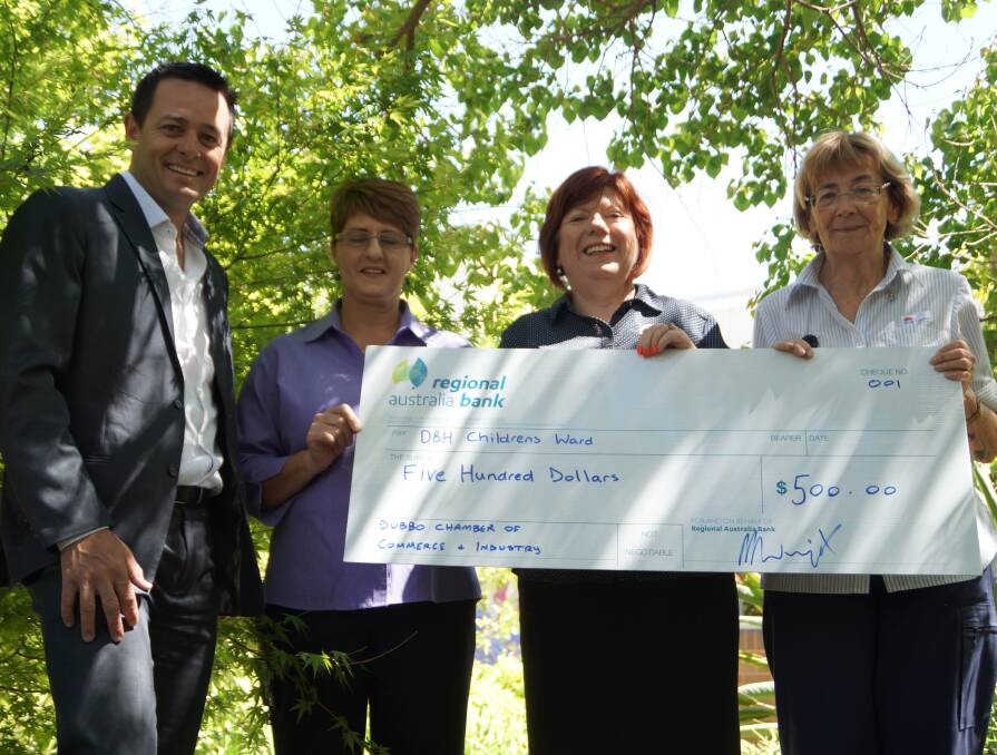DONATION: Dubbo Chamber of Commerce president Matt Wright, with childrens' ward play therapist Tracey Berry, chamber member services officer Toni Beatty and nursing unit manager Deanne Dent.