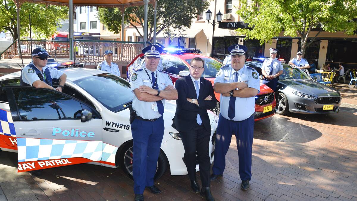 Troy Grant with members of the NSW police force at the launch of Operation West Force. Photo: BELINDA SOOLE