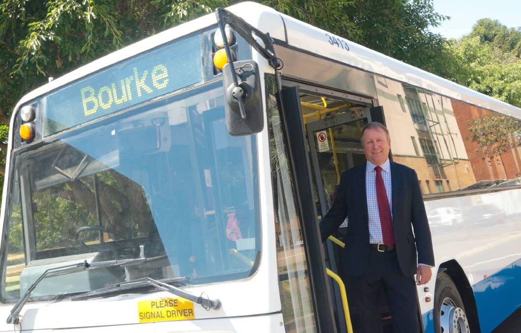 Kevin Humphries takes a ride on the new Bourke bus.