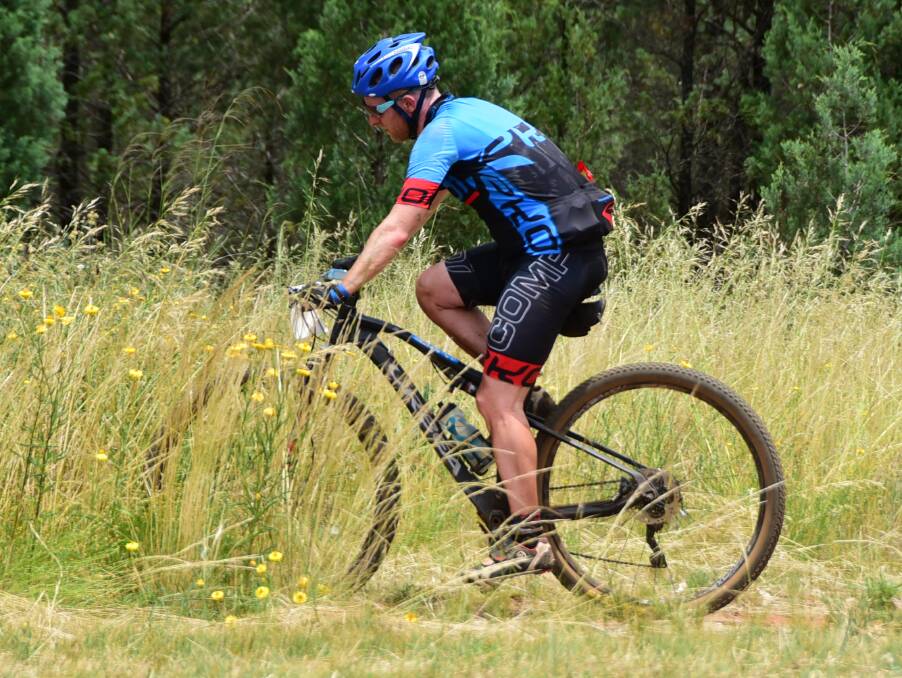 DISAPPEARING: The long grass was one of the elements riders had to combat in the Dubbo 300.