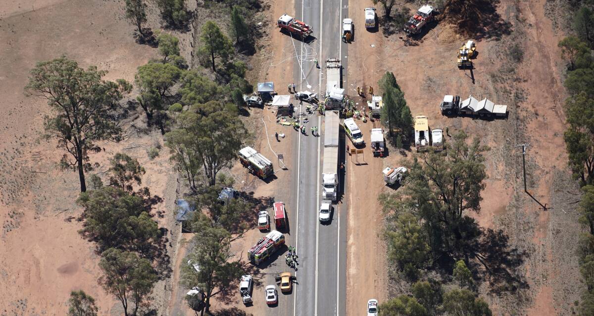 TERRIBLE: An aerial view of the carnage of last Tuesday's horrific crash on the Newell Highway. Photo: BRADLEY GUEST