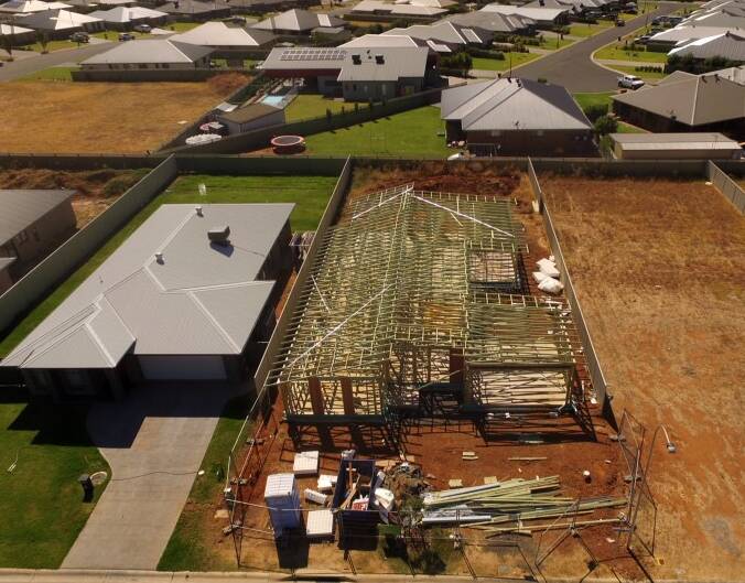 BUILDING BOOM: Dubbo continues to see massive growth in the construction of new homes and units, which is keeping the affordability issue at bay more than in other centres. Photo: DRONEART