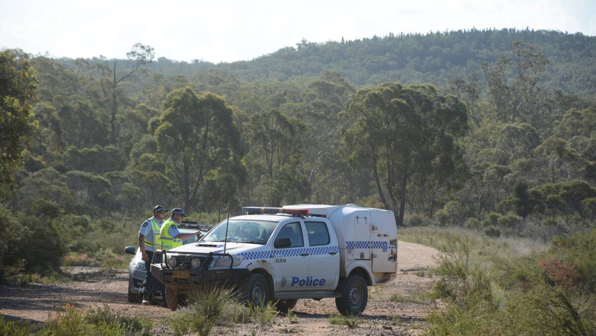 Police manning one of the rugged roads near 'Pinevale'.