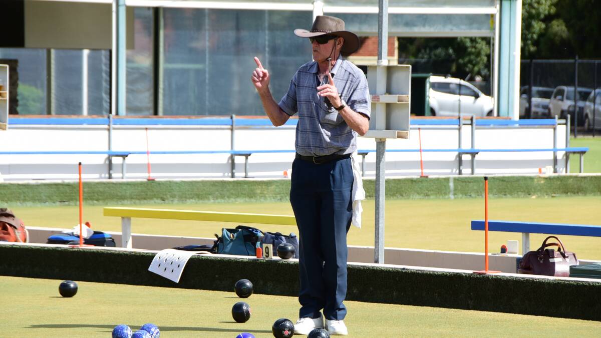 MISSED BY THAT MUCH: John Lampard measuring shots at Dubbo City Bowling Club. Photo: BELINDA SOOLE