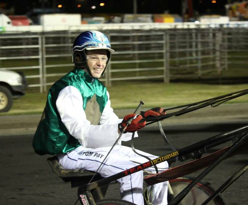 ALL SMILES: Tom Pay will jump in the gig for four drives at the Dubbo Paceway on Sunday.
