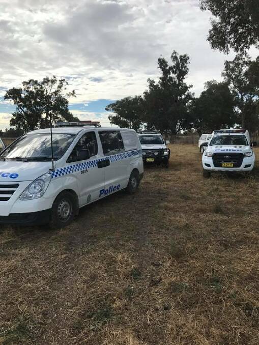 ON THE SCENE: Police vehicles at the property where sheep were allegedly killed by neighbouring dogs. Photo: FACEBOOK