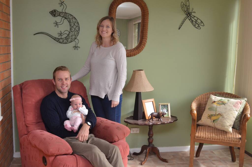 ON TREND: Joey and Naomi Currall with their daughter Olivia Anne Currall who was born in February. 