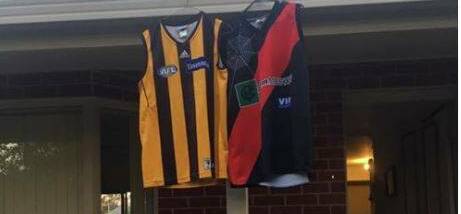 Locals put their footy jumpers out in tribute to sporting identity Karl Jacka.