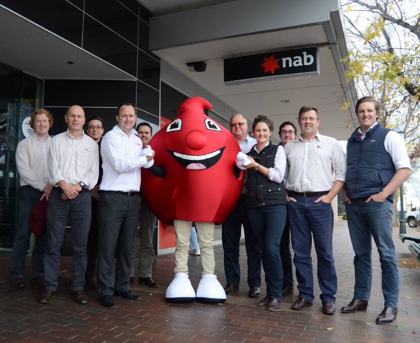 LAUNCH: Australian Red Cross Blood Service's Brian Bruce met with NAB staff in Dubbo on Tuesday morning to launch the competition. Photo: ELOUISE HAWKEY