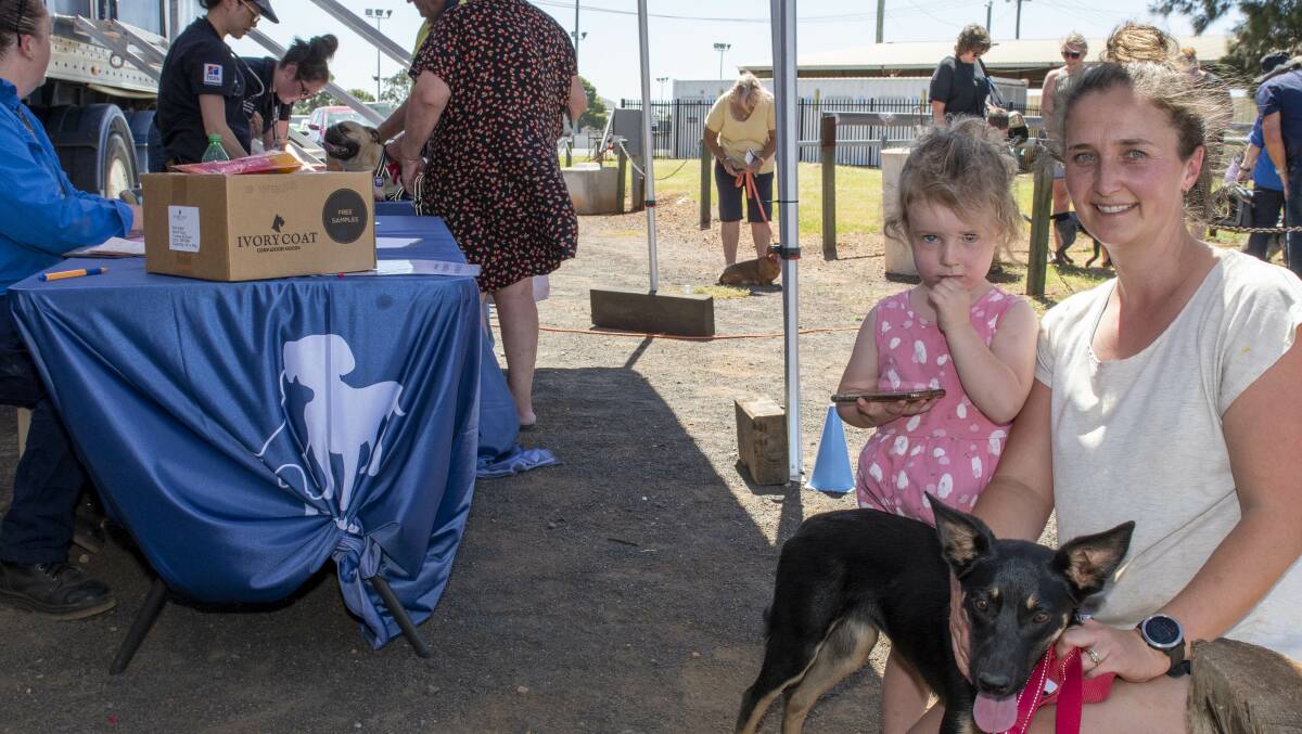 Kerriann Swinton and daughter Zoey Swinton with Nelly, their kelpie who was chipped and vaccinated at the Animal Welfare League's vet truck in 2023. Picture by Belinda Soole