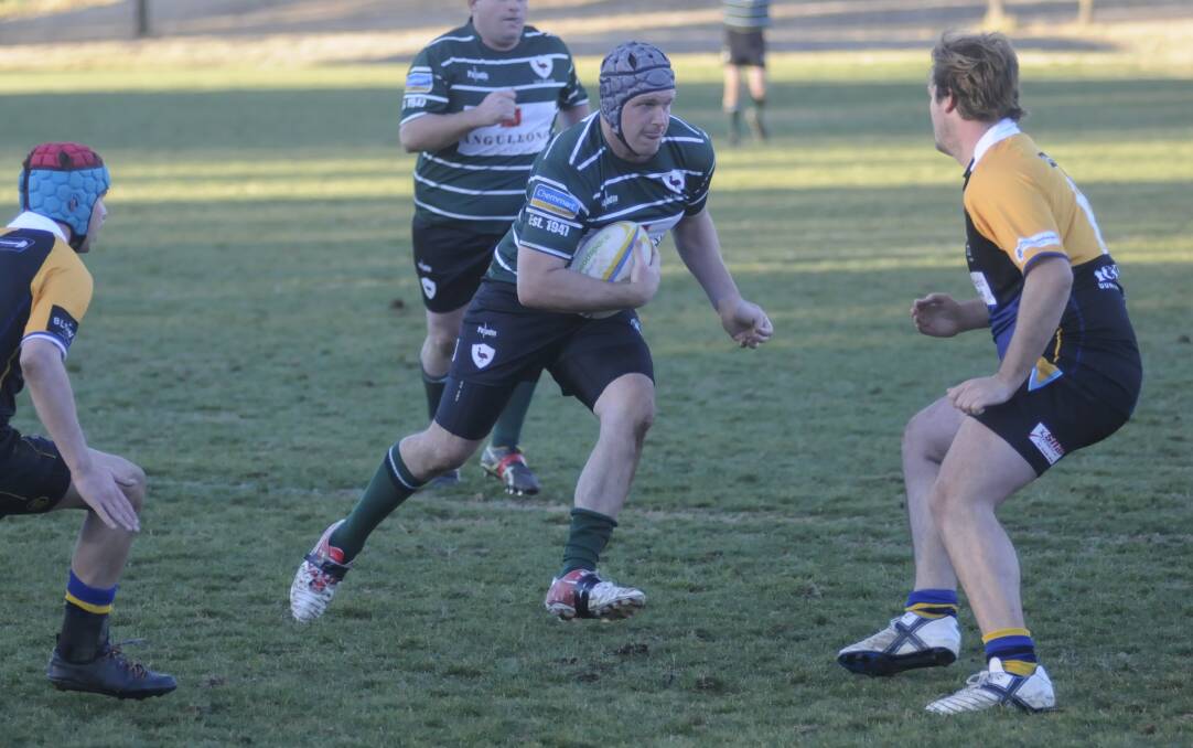 GREENS MACHINE: Emus No.8 Rob Thorburn crossed for one of the greens' eight tries in Saturday's 45-point victory over the gallant students. Photo: CHRIS SEABROOK