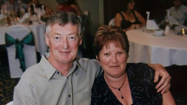 MYSTERY: John Burrows, 58, a well-known local greyhound trainer was blown up outside his Portland house. He is pictured here with his wife Shirley. 