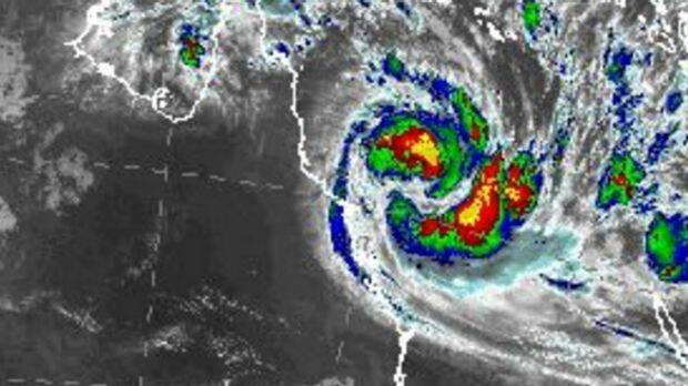 Tropical Cyclone Debbie intensified to a category two system overnight and was expected to make landfall between Townsville and Proserpine on Tuesday morning as a category four. Photo: Bureau of Meteorology 