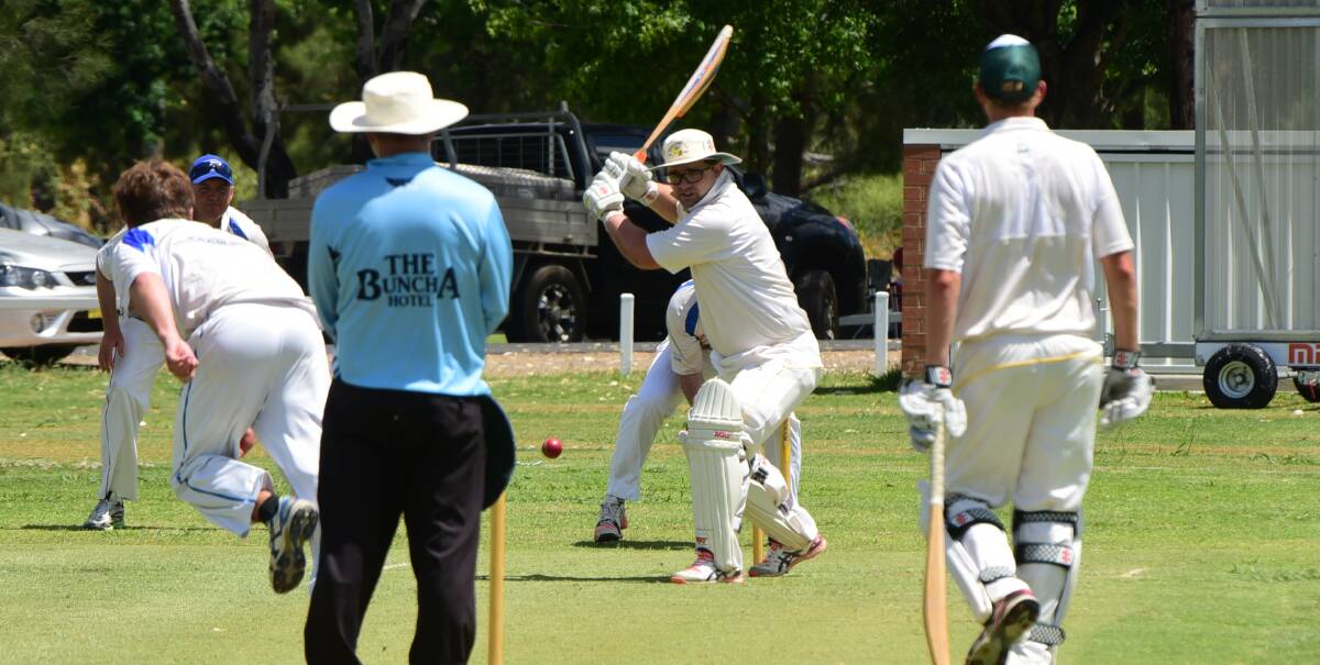 Souths batsman Greg Rummans watches a ball pass through to the wicketkeeper.