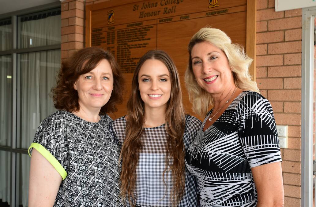 GREAT ACHIEVEMENT: Maree and Ainsley Carlow with St John's principal Kerry Morris at the school's HSC morning tea. Photo: BELINDA SOOLE