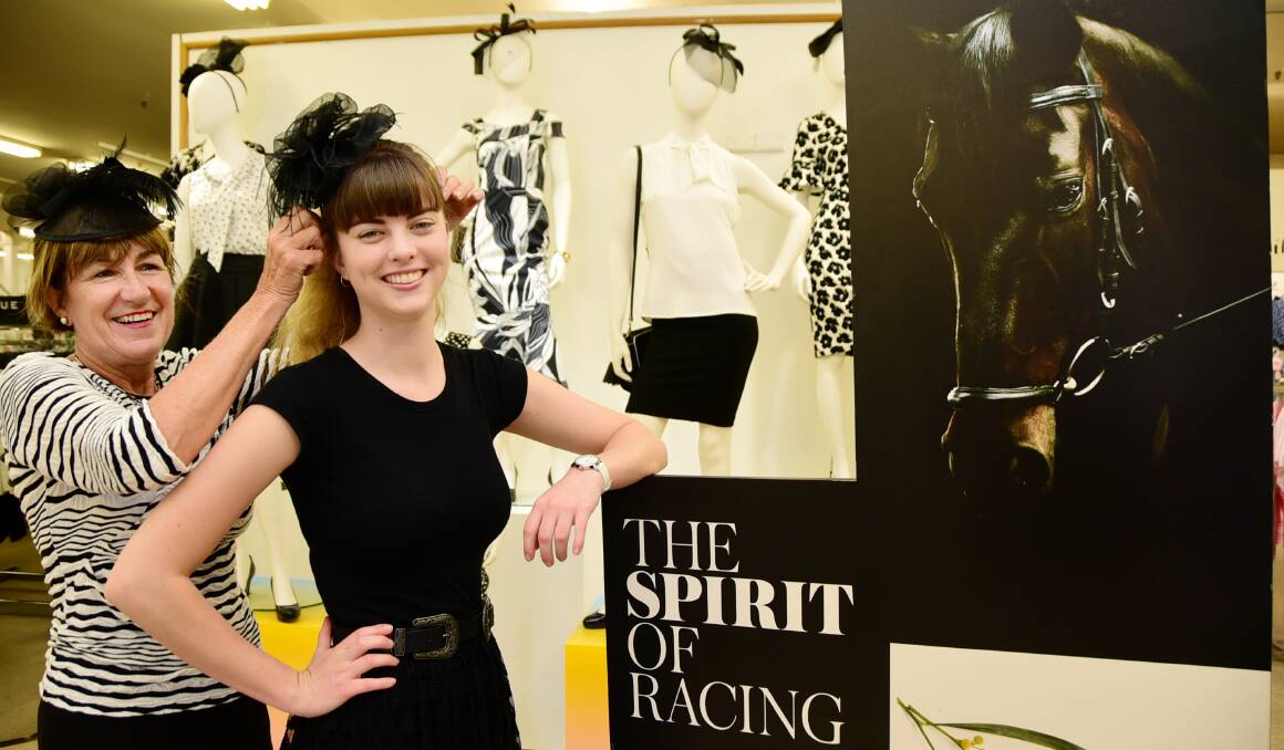 RACE READY: Myer staff Suzie Keen and Molly Minehan were dressed in their black and white best for Derby Day. Photo: BELINDA SOOLE