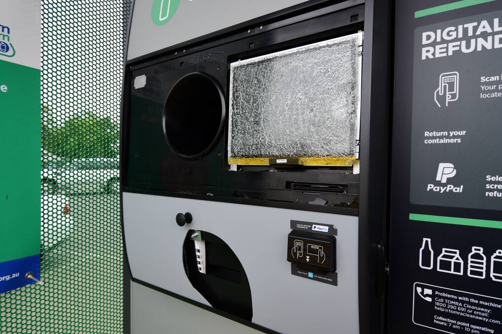 The screen was smashed, a panel was removed, and a hole was smashed in the plastic of this Return and Earn machine at Victoria Park. Photo: BELINDA SOOLE