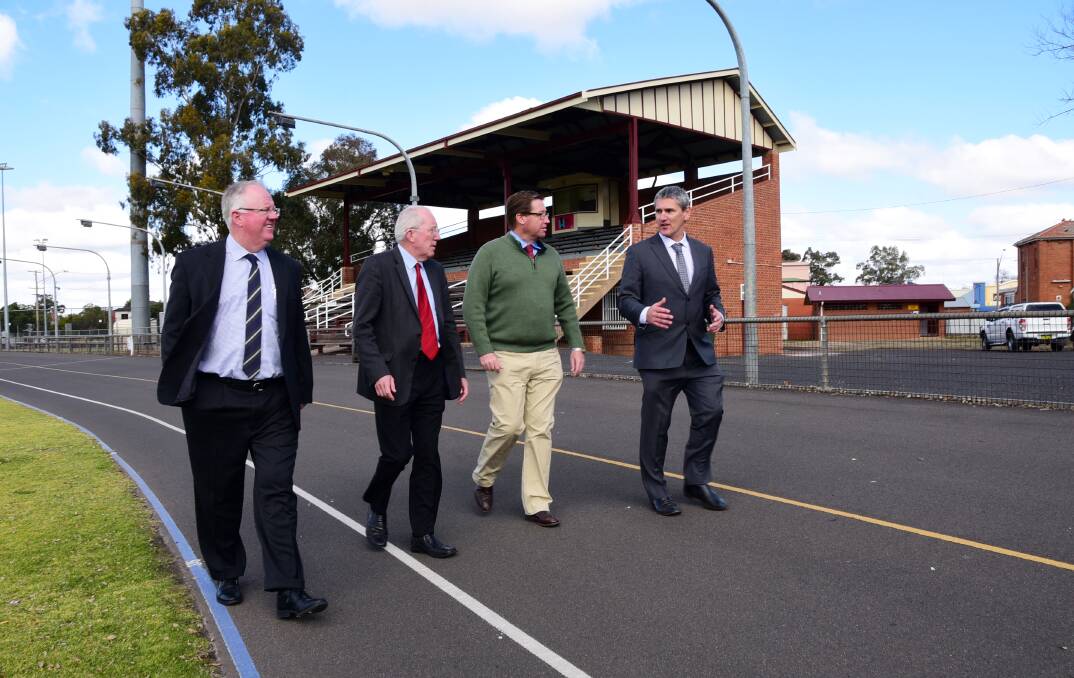 Big news: Dubbo Regional Council's Mark Riley, Michael Kneipp and Murray Wood discuss Victoria Park upgrades with Troy Grant (second from right). Photo: BELINDA SOOLE
