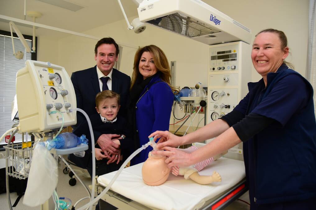 LIFESAVER: Paul, Thomas and Charmaine Dalgleish are shown the equipment they donated to Dubbo Hospital by its neonatal care unit's clinical nurse consultant Leanne Haigh. Photo: BELINDA SOOLE 