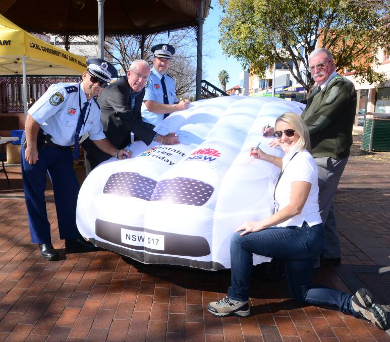 MY PLEDGE: Dan Skelly, Michael Kneipp, Scott Tanner, Bob Burt and Jayne Bleechmore are encouraging others to make a commitment to safe driving. Photo: BELINDA SOOLE