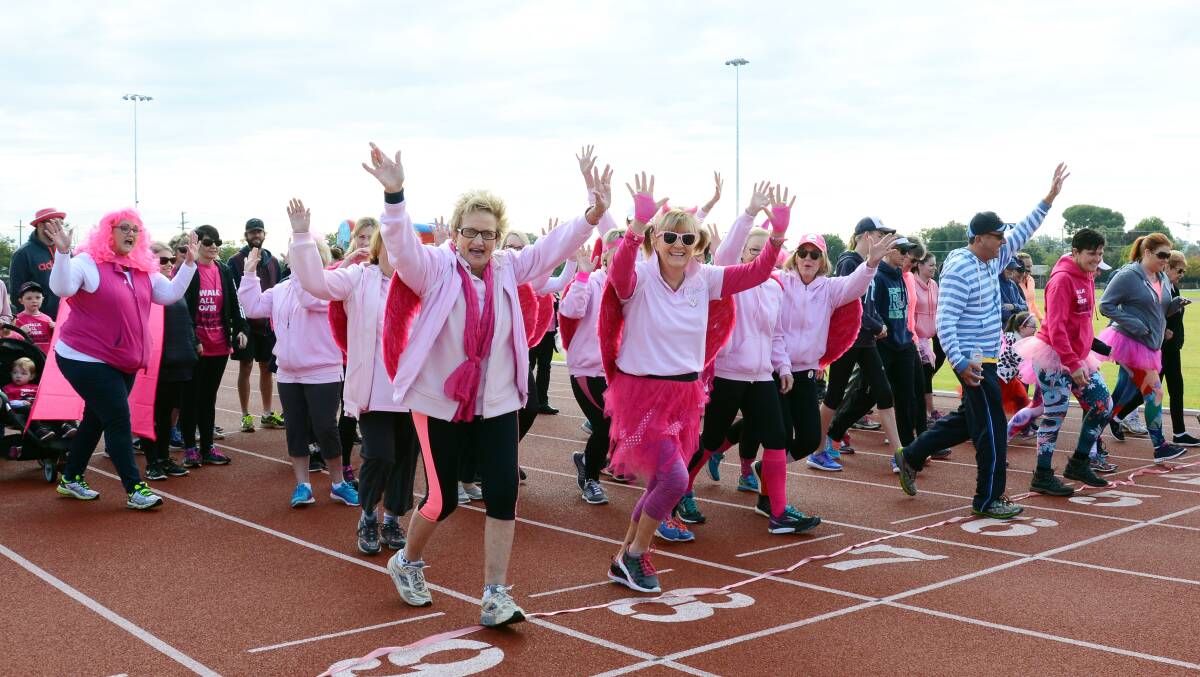PRETTY IN PINK: Dressed in their Sunday best, the participants of the Mother's Day Classic walked four kilometres. Photo: BELINDA SOOLE