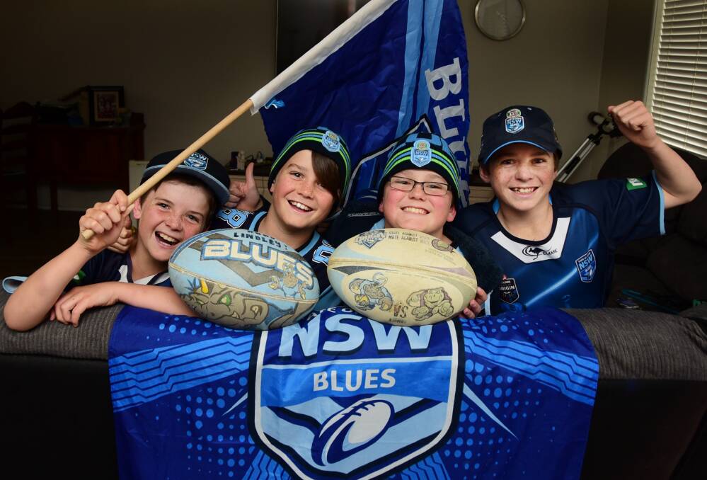 Go the Blues: Brothers Rory, Declan, Hayden and Connor at their Dubbo home ready to cheer NSW to victory in the 2017 State of Origin decider against Queensland on Wednesday night. Photo: BELINDA SOOLE